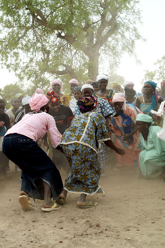 Women of a tribe in Burkina Faso dancing. Leica R9 DMR with Leica 35-70mm f/2.8.© Thorsten von Overgaard. 